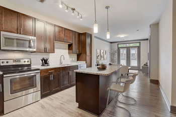 Spacious kitchen islands with serving bars